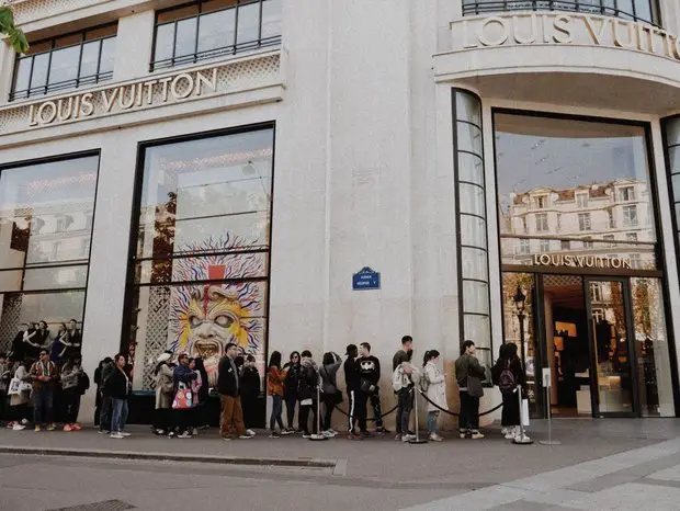 The entrance of Louis Vuitton Paris Store on Boulevard Champs