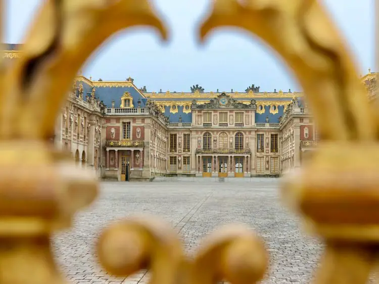 entering palace of versailles