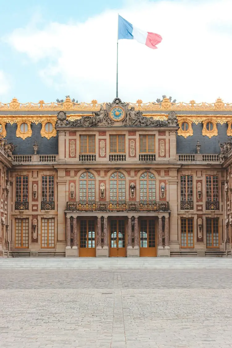 entering palace of versailles