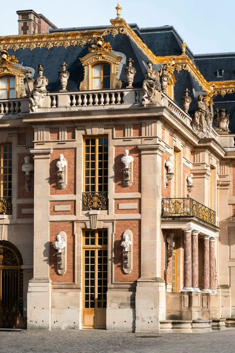 entering palace of versailles