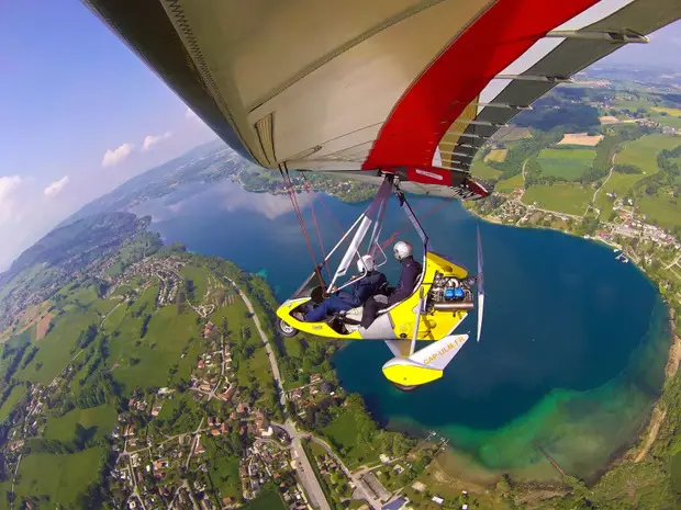 people paragliding